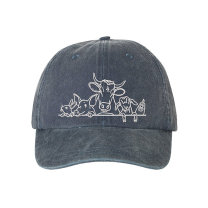 Navy Blue Farm Animals Washed Baseball Hat featuring detailed cow and farm animal embroidery on a premium washed dad cap; a heritage-inspired piece by DSY Lifestyle.