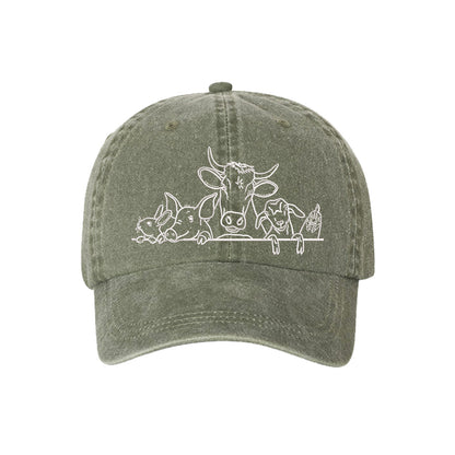 Olive Farm Animals Washed Baseball Hat featuring detailed cow and farm animal embroidery on a premium washed dad cap; a heritage-inspired piece by DSY Lifestyle.
