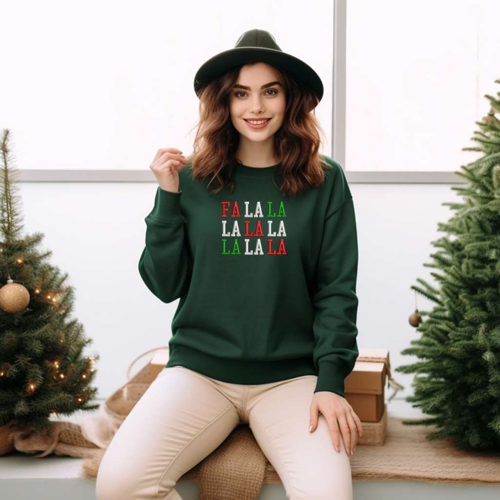 Female wearing a forest green sweatshirt embroidered with Fa la la in Christmas Colors - DSY Lifestyle