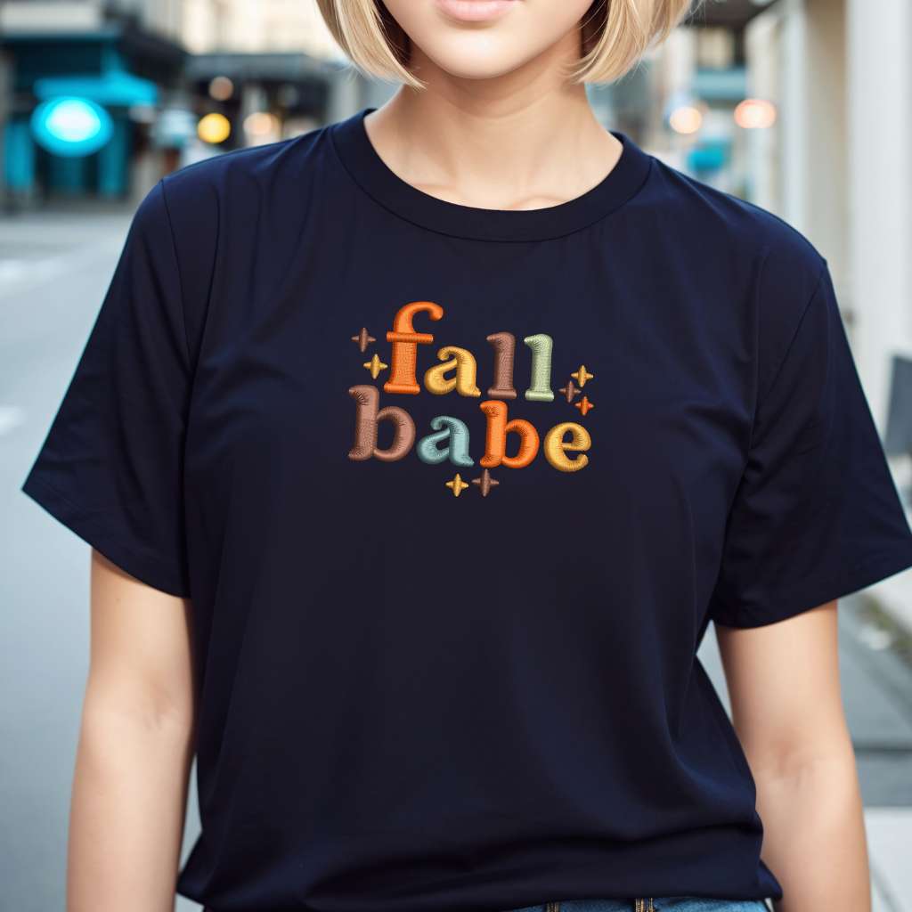 Female wearing a Navy t-shirt embroidered with Fall Babe - DSY Lifestyle