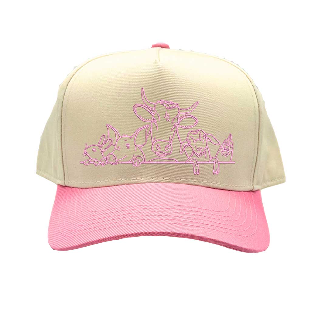 Natural Light Pink DSY Lifestyle two-tone baseball hat with a natural crown and  contrasting bill, featuring an embroidered graphic of a cow, pig, and rooster family. - DSY Lifestyle
