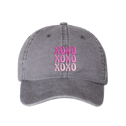 Gray XOXO Washed Baseball Hat featuring white "XOXO" embroidery on a vintage-washed charcoal dad cap by DSY Lifestyle.