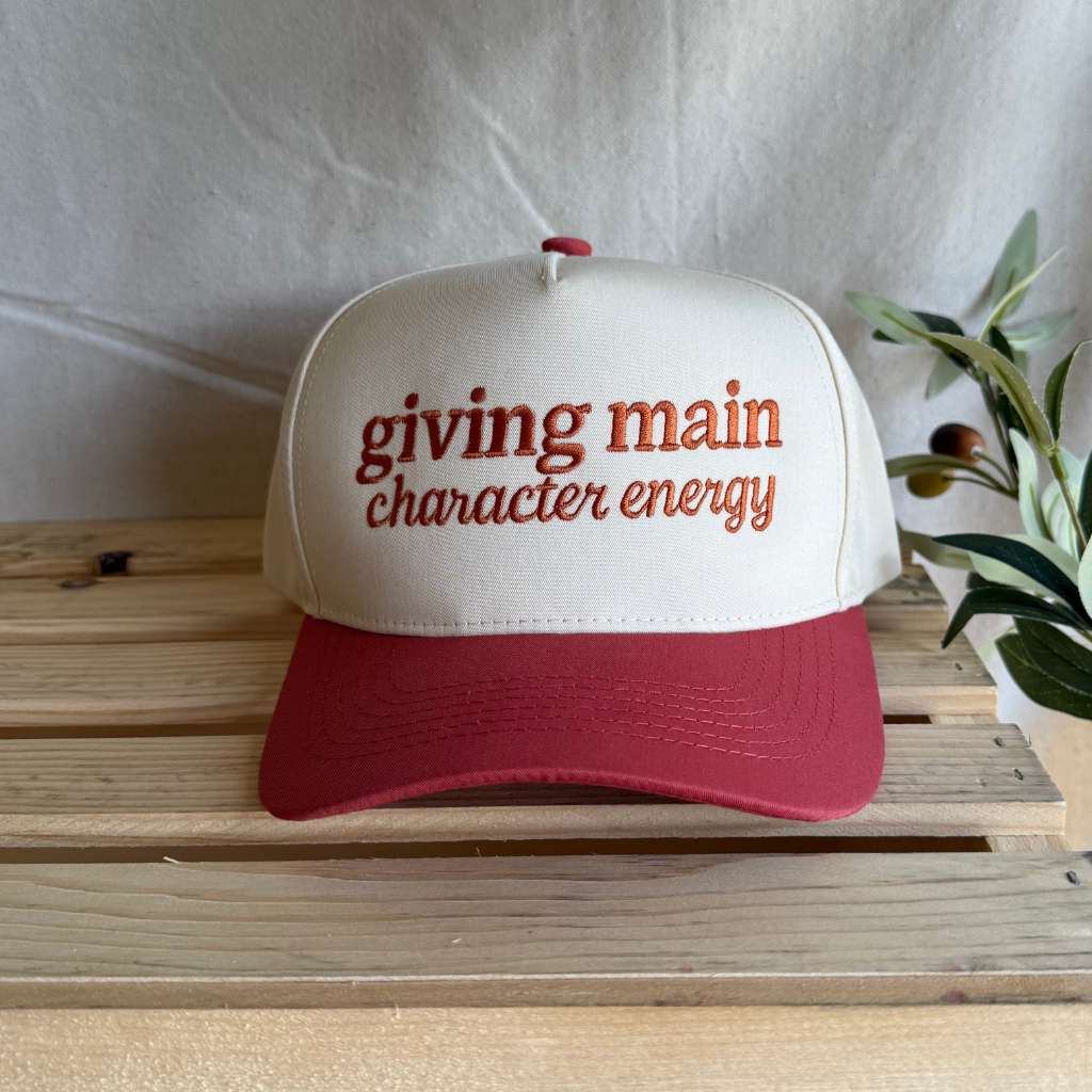 White and red cap with text &