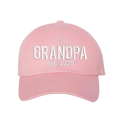 Light Pink Grandpa Est. 2026 Baseball Hat featuring bold white embroidery on a premium dad cap; a stylish 2026 announcement gift for new grandfathers by DSY Lifestyle.