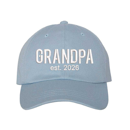 Sky Blue Grandpa Est. 2026 Baseball Hat featuring bold white embroidery on a premium dad cap; a stylish 2026 announcement gift for new grandfathers by DSY Lifestyle.