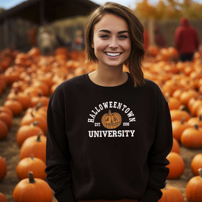 Female wearing a brown sweatshirt embroidered with Halloweentown University Est. 1998 and a pumpkin - DSY Lifestyle