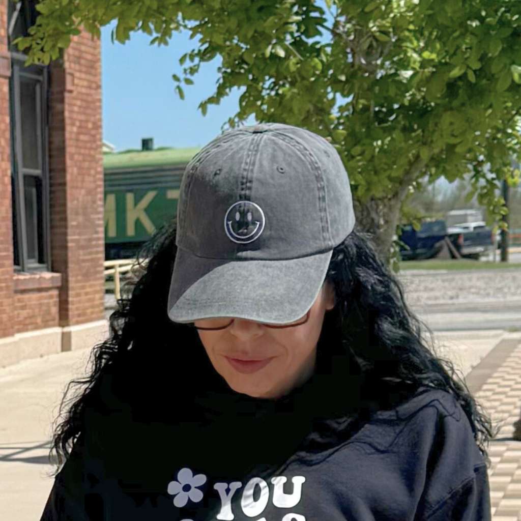 Women wearing a Happy Face Black Washed baseball hat