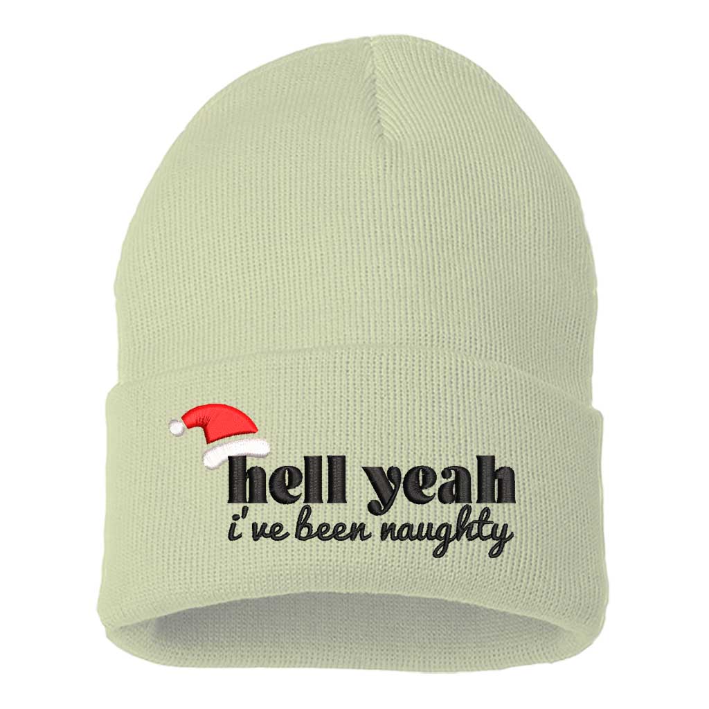 Cream Hell Yeah I’ve Been Naughty Embroidered Beanie Cap featuring festive red embroidery on a soft winter knit hat, perfect for Christmas humor and holiday style - DSY Lifestyle