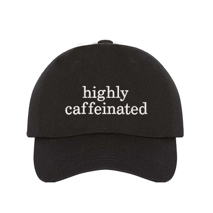 Black cotton baseball hat featuring the phrase Highly Caffeinated in bold, crisp white embroidery. - DSY Lifestyle