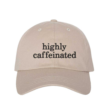 Stone cotton baseball hat featuring the phrase Highly Caffeinated in bold, crisp black embroidery. - DSY Lifestyle