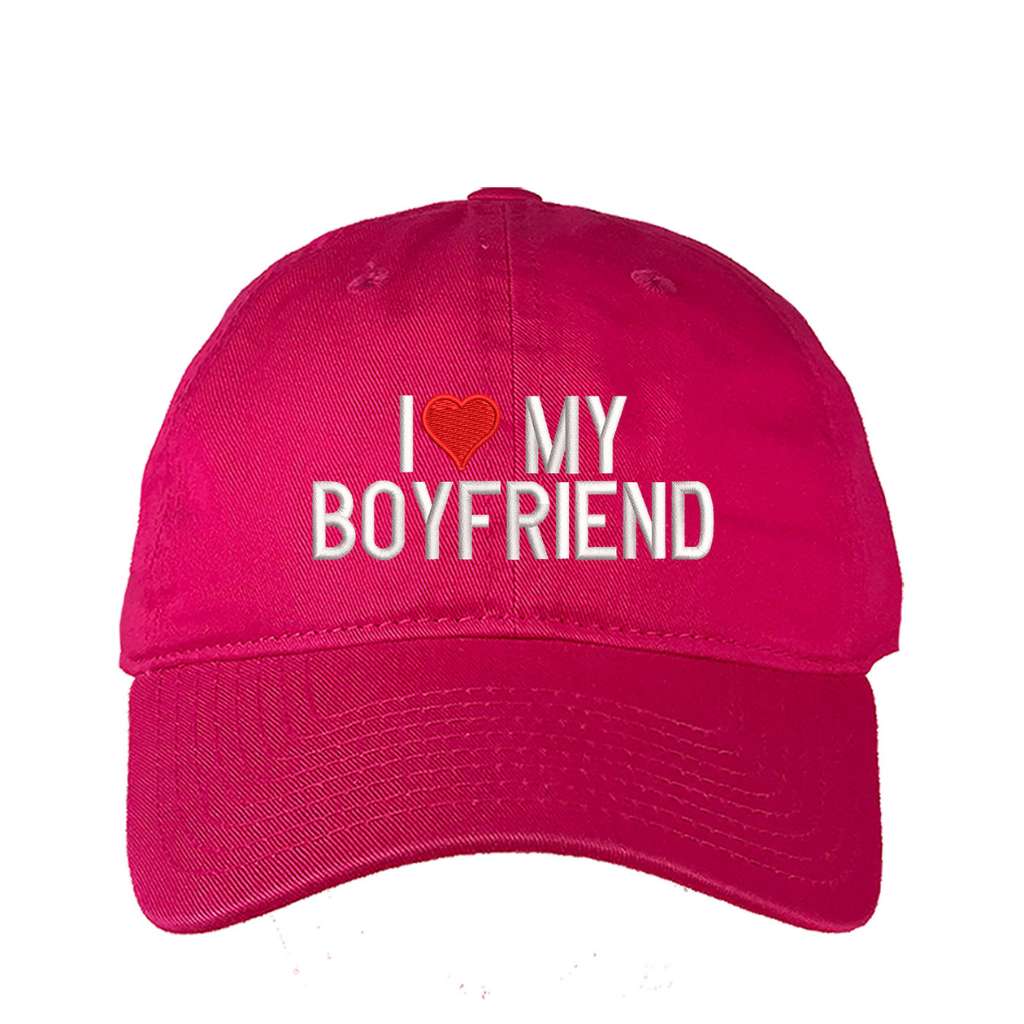 Hot pink baseball hat embroidered with the phrase I love my boyfriend but love is a heart- DSY Lifestyle