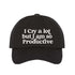 Black I Cry A Lot But I Am So Productive Embroidered Baseball Hat in cotton with curved brim and hook and loop closure. - DSY Lifestyle.