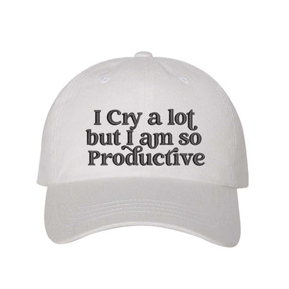 White I Cry A Lot But I Am So Productive Embroidered Baseball Hat in cotton with curved brim and hook and loop closure. - DSY Lifestyle.