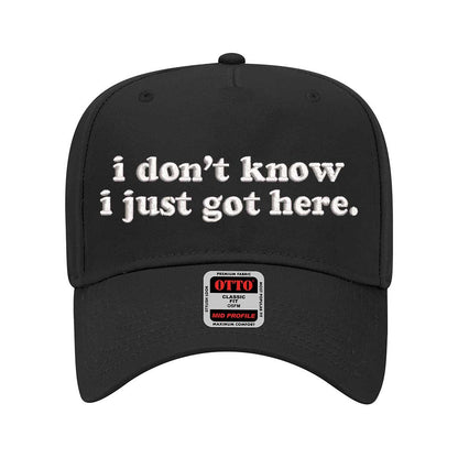 Black solid 5 panel baseball hat embroidered with the phrase i don&