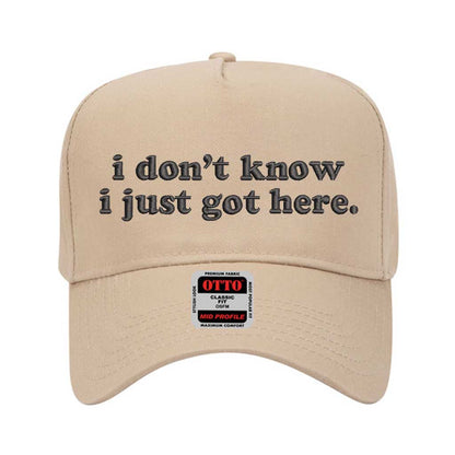 Khaki solid 5 panel baseball hat embroidered with the phrase i don&