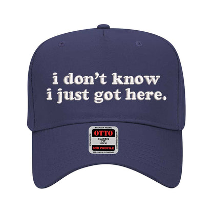 Navy solid 5 panel baseball hat embroidered with the phrase i don&