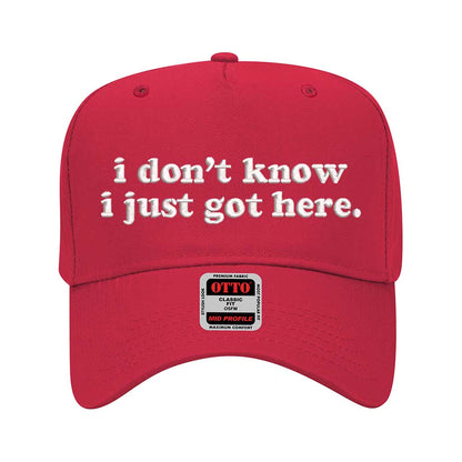 Red solid 5 panel baseball hat embroidered with the phrase i don&