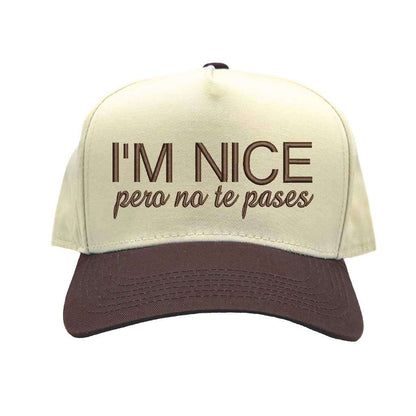 Beige and brown cap with text &