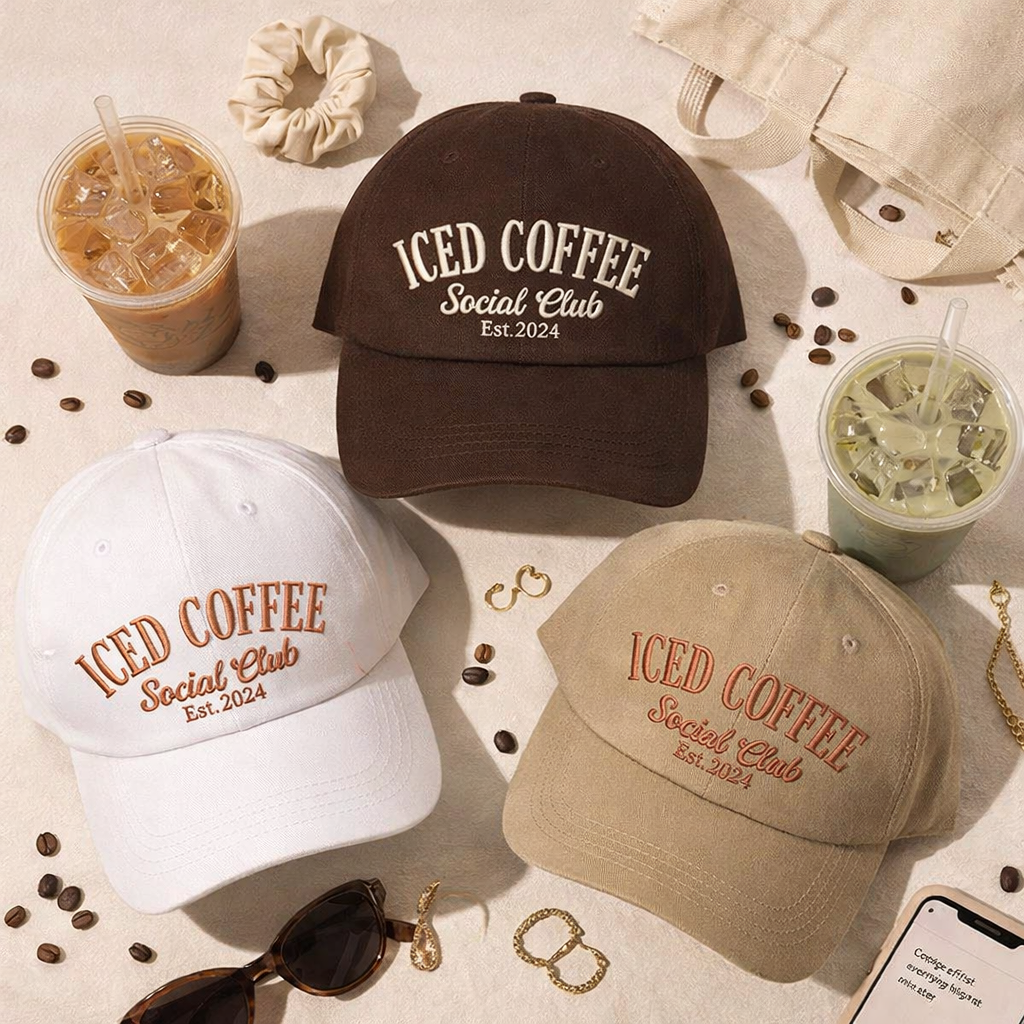 Three baseball caps embroidered with &