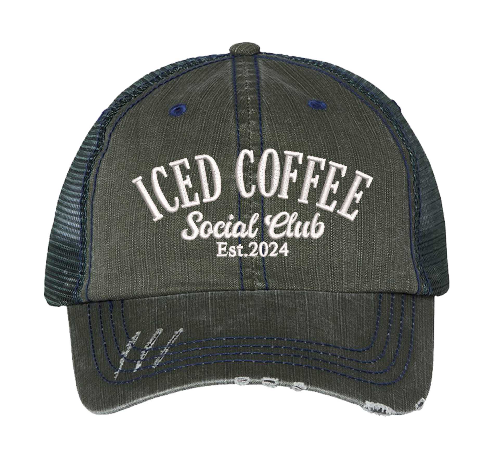 Dark Green Iced Coffee Social Club Est. 2024 Distressed Trucker Hat. This premium vintage-style cap is the perfect gift for the unapologetically bold, featuring a breathable mesh back and custom embroidery. - DSY Lifestyle