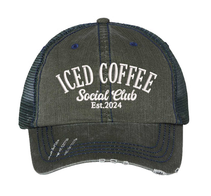 Dark Green Iced Coffee Social Club Est. 2024 Distressed Trucker Hat. This premium vintage-style cap is the perfect gift for the unapologetically bold, featuring a breathable mesh back and custom embroidery. - DSY Lifestyle