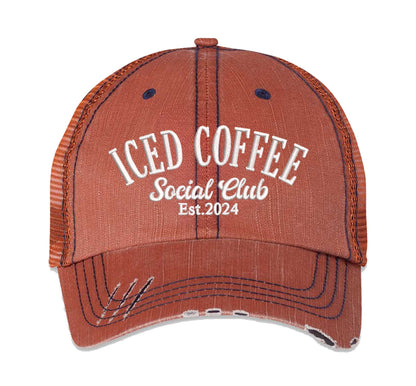 Orange Iced Coffee Social Club Est. 2024 Distressed Trucker Hat. This premium vintage-style cap is the perfect gift for the unapologetically bold, featuring a breathable mesh back and custom embroidery. - DSY Lifestyle