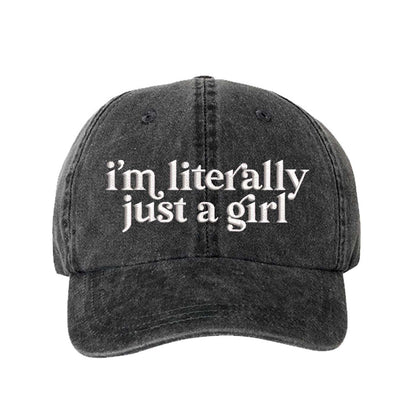 Black I’m Literally Just A Girl washed cotton baseball hat with a soft finish and high-density white embroidery by DSY Lifestyle. - DSY Lifestyle