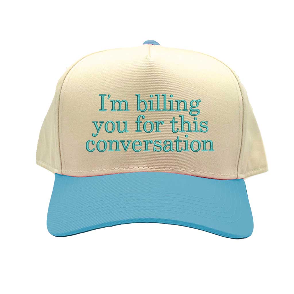 Beige and blue cap with text &
