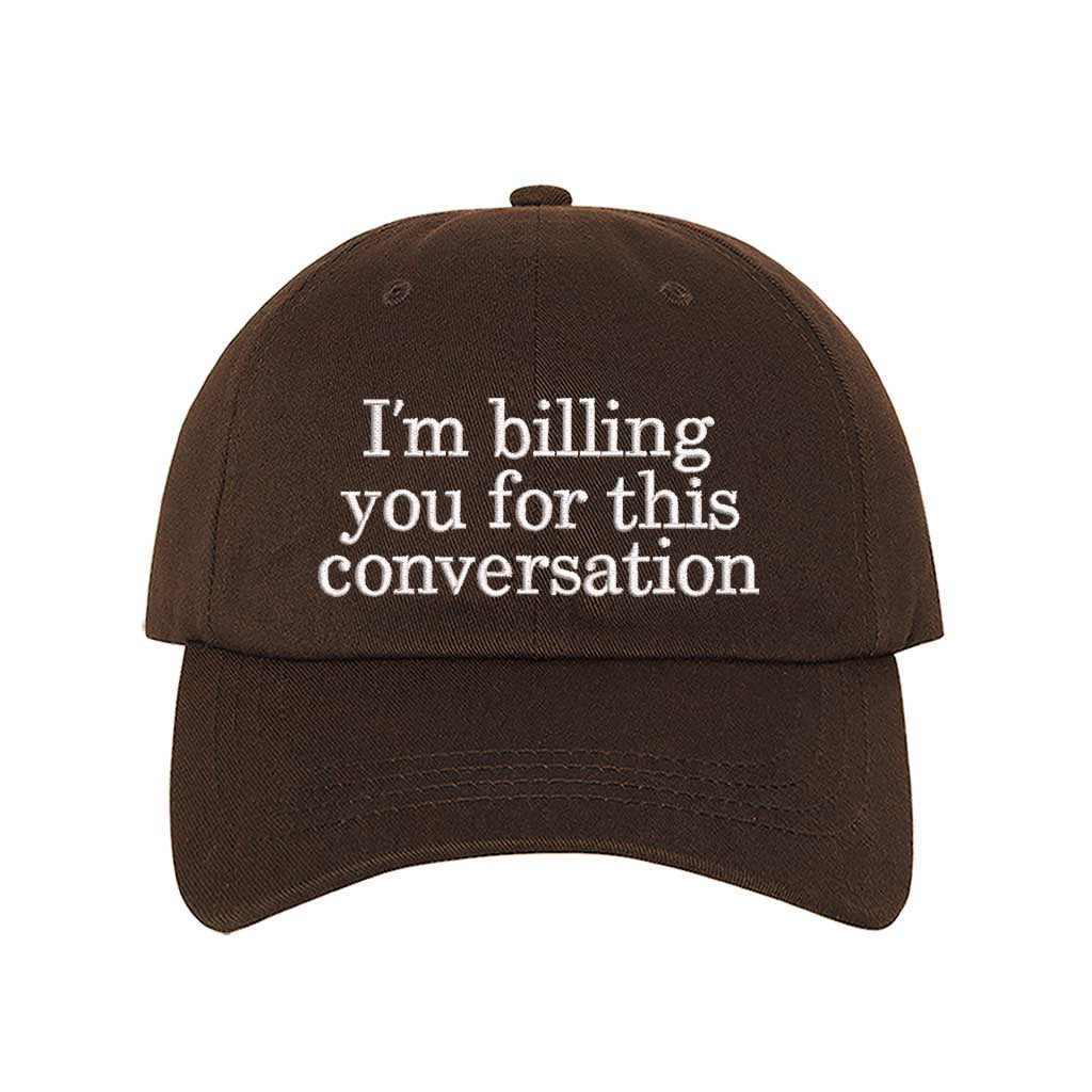 Brown cap with white text &