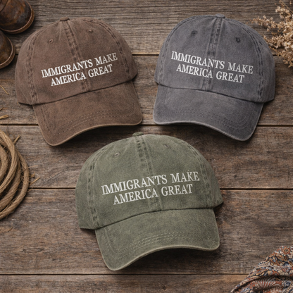 Flat lay of Chocolate Brown, Gray, and Olive DSY Lifestyle washed cotton baseball hats featuring the phrase Immigrants Make America Again in bold, professional embroidery. - DSY Lifestyle