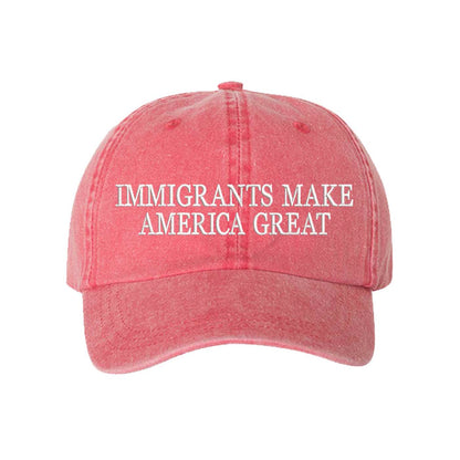 Red DSY Lifestyle washed cotton baseball hat featuring the phrase Immigrants Make America Again in bold, professional embroidery. - DSY Lifestyle
