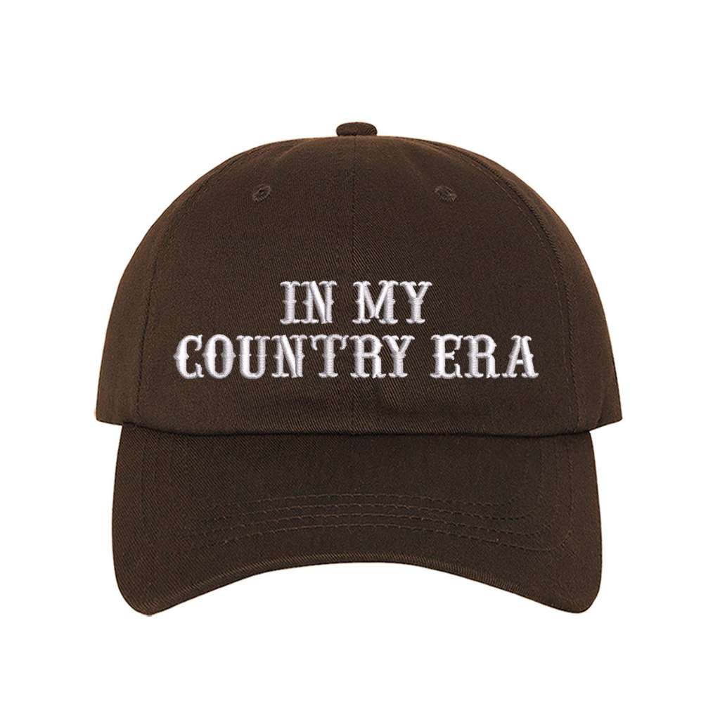 Brown Baseball hat thats embroidered with the phrase in my country era on the front-DSY Lifestyle 