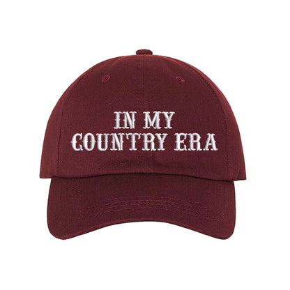 Burgundy Baseball hat thats embroidered with the phrase in my country era on the front-DSY Lifestyle 
