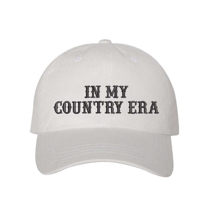 White Baseball hat thats embroidered with the phrase in my country era on the front-DSY Lifestyle 