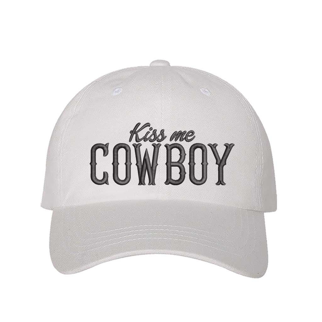 White Kiss Me Cowboy embroidered baseball hat with a curved brim and adjustable hook-and-loop closure, perfect for country concerts and rodeo lovers – DSY Lifestyle