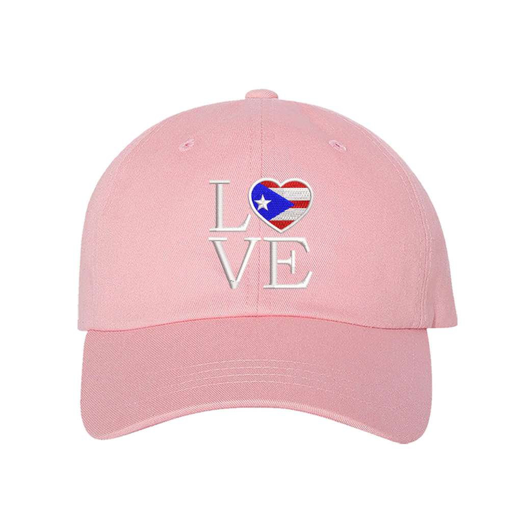 Light pink baseball hat embroidered with Love but. the o in love is a heart with the puerto rico flag in it- DSY Lifestyle