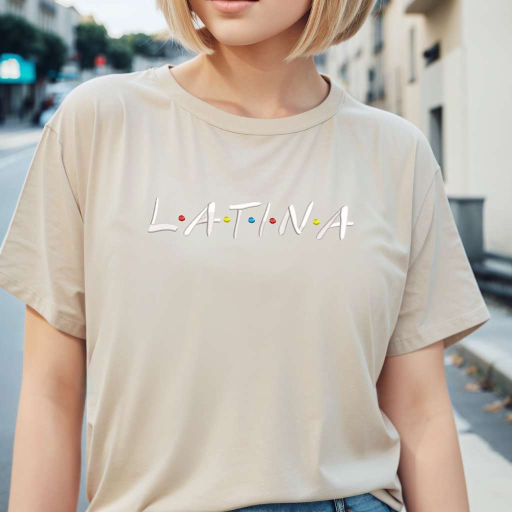 Female wearing a sand unisex tshirt embroidered with Latina - DSY Lifestyle