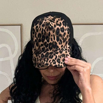 Woman wearing Leopard Trucker Hat
