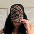 Woman wearing Leopard Trucker Hat
