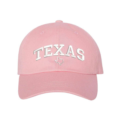 Light Pink baseball hat embroidered with the word texas and a small map of texas underneath the word- DSY Lifestyle