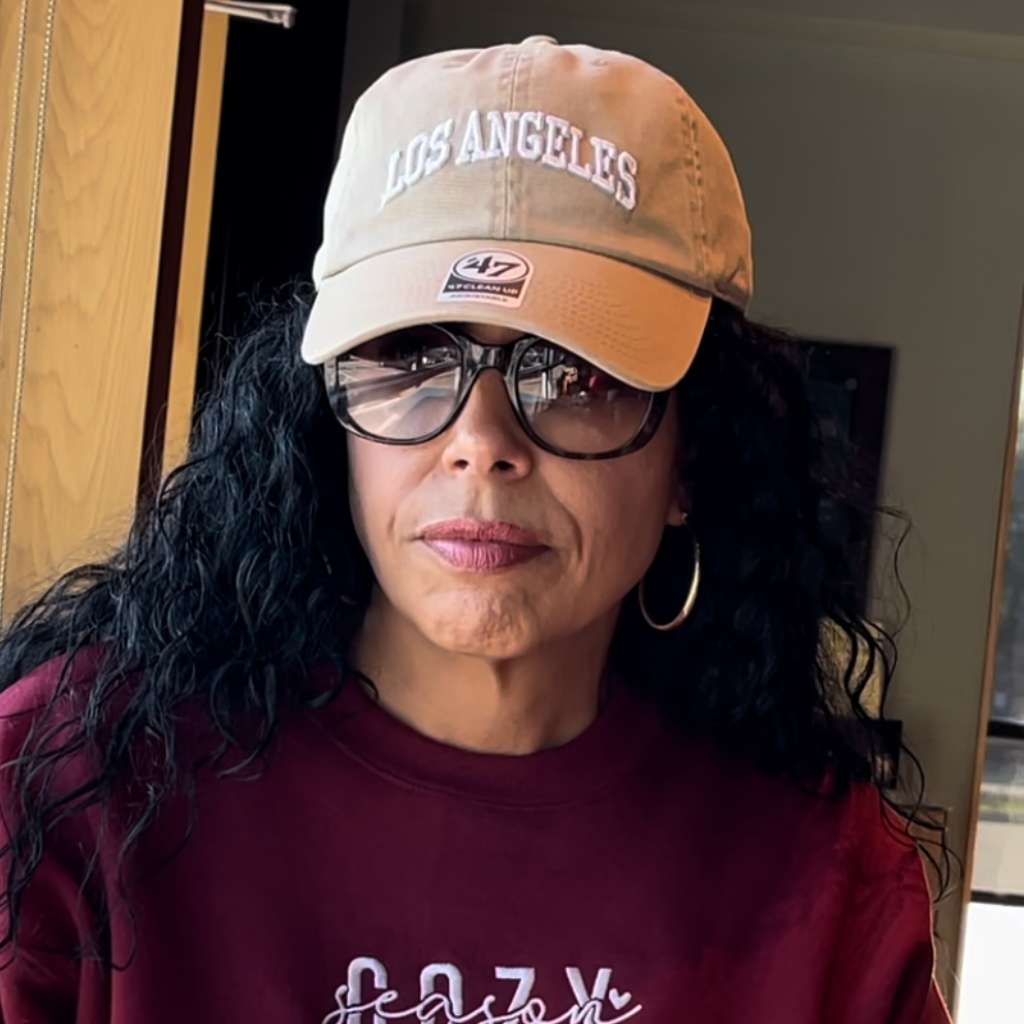 Female wearing a khaki Baseball Hat embroidered with Los Angeles in 3D - DSY Lifestyle 