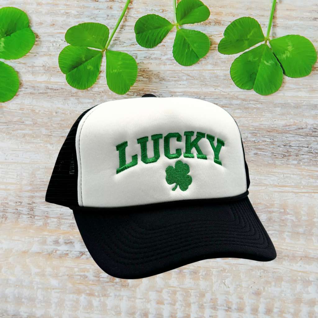 Black &amp; White foam trucker hat embroidered with Lucky in green and a four leaf clover - DSY Lifestyle