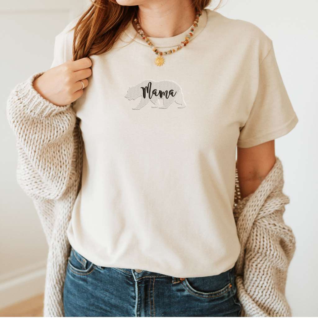 Female wearing a sand t-shirt embroidered with a mama bear - DSY Lifestyle
