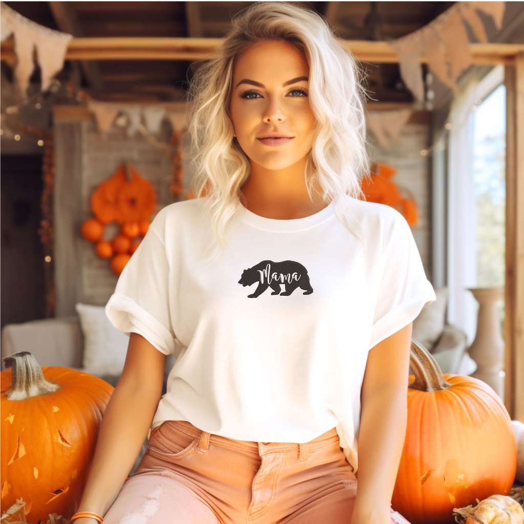 Female wearing a white t-shirt embroidered with a mama bear - DSY Lifestyle