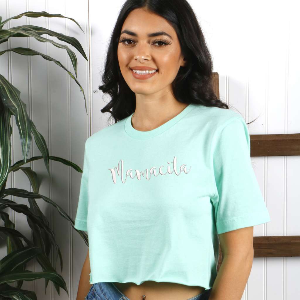 Female wearing a mint crop top embroidered with Mamacita - DSY Lifestyle