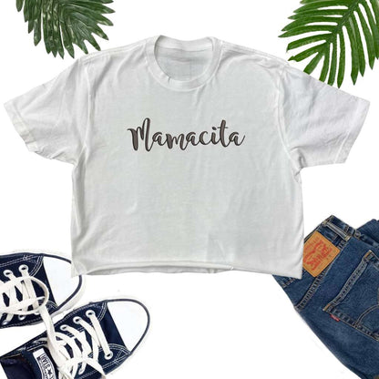 Female wearing a white crop top embroidered with Mamacita - DSY Lifestyle