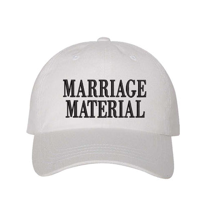 White Marriage Material Embroidered Baseball Hat in soft cotton with pre-curved brim and adjustable hook and loop closure. DSY Lifestyle.