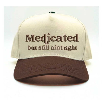 Natural with Brown bill Two-tone 5-panel baseball hat with &quot;Medicated But Still Ain’t Right&quot; embroidered in bold lettering, featuring a structured fit and adjustable strap for a comfortable, stylish look - DSY Lifestyle