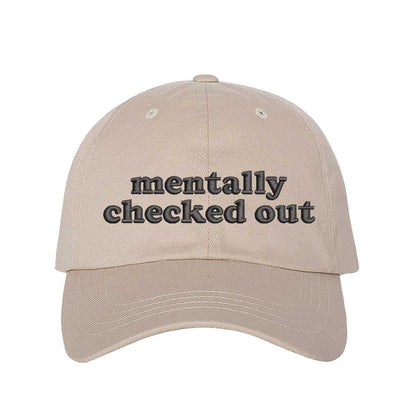 Stone cotton baseball hats with the phrase Mentally Checked Out embroidered black thread in a clean, modern font. - DSY Lifestyle