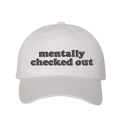 White cotton baseball hats with the phrase Mentally Checked Out embroidered black thread in a clean, modern font. - DSY Lifestyle